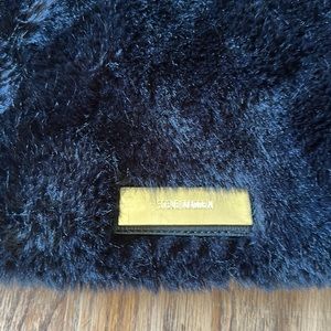 Fur black purse can be over the shoulder or crossbody